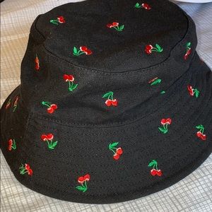 Black bucket hat with cherries on top! 🍒